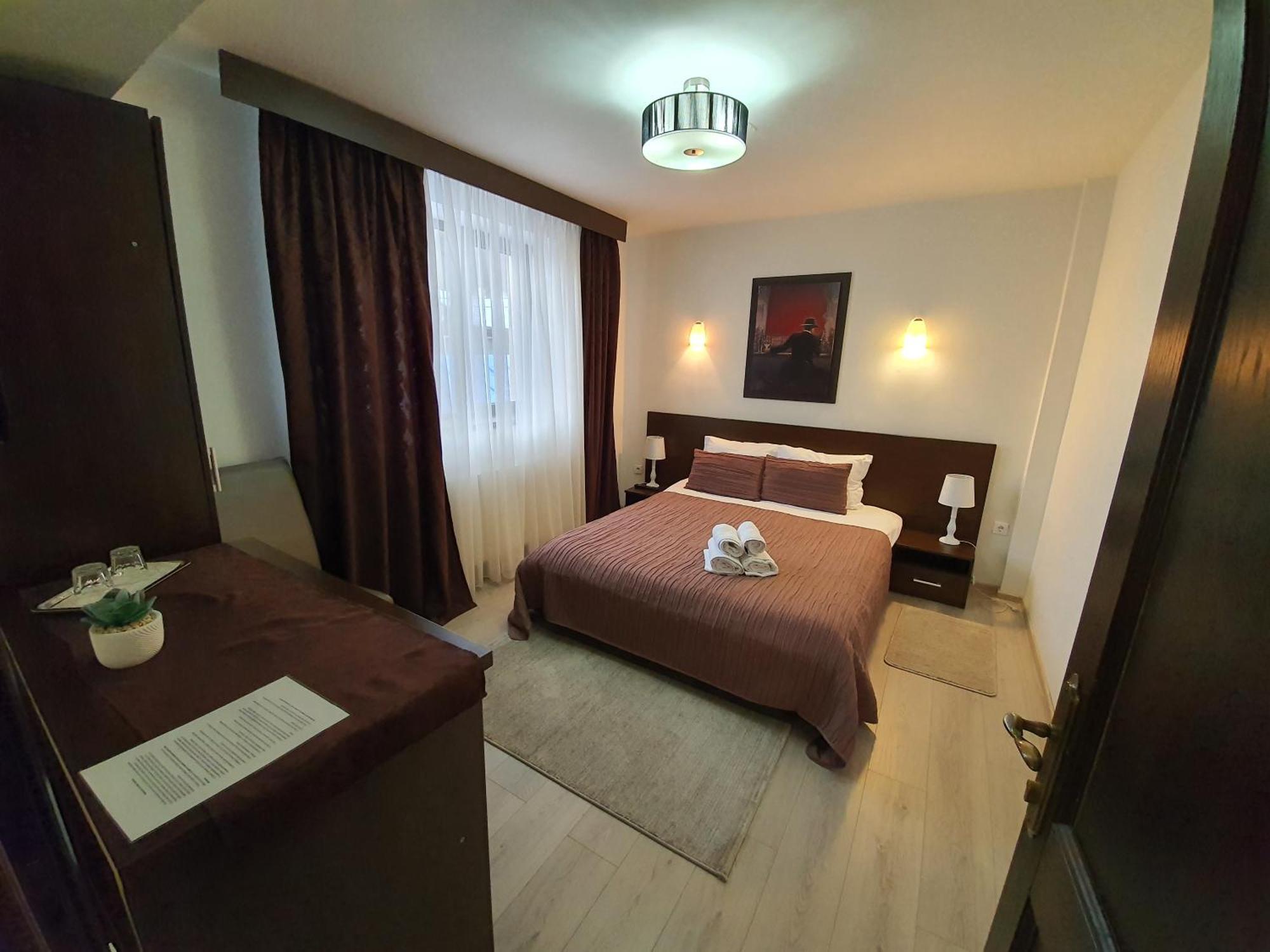 Pensiunea Public House Буштені Номер фото