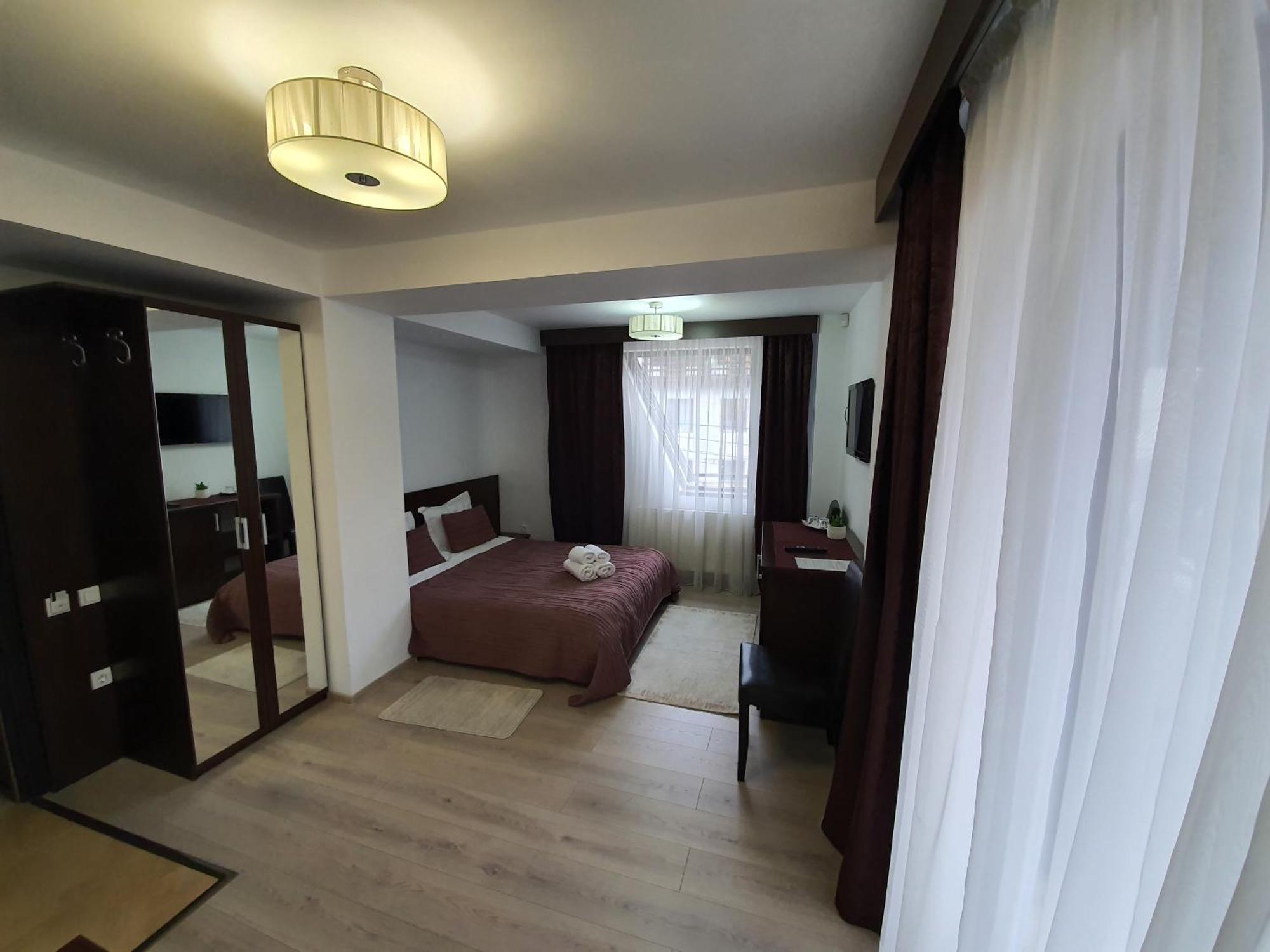 Pensiunea Public House Буштені Номер фото